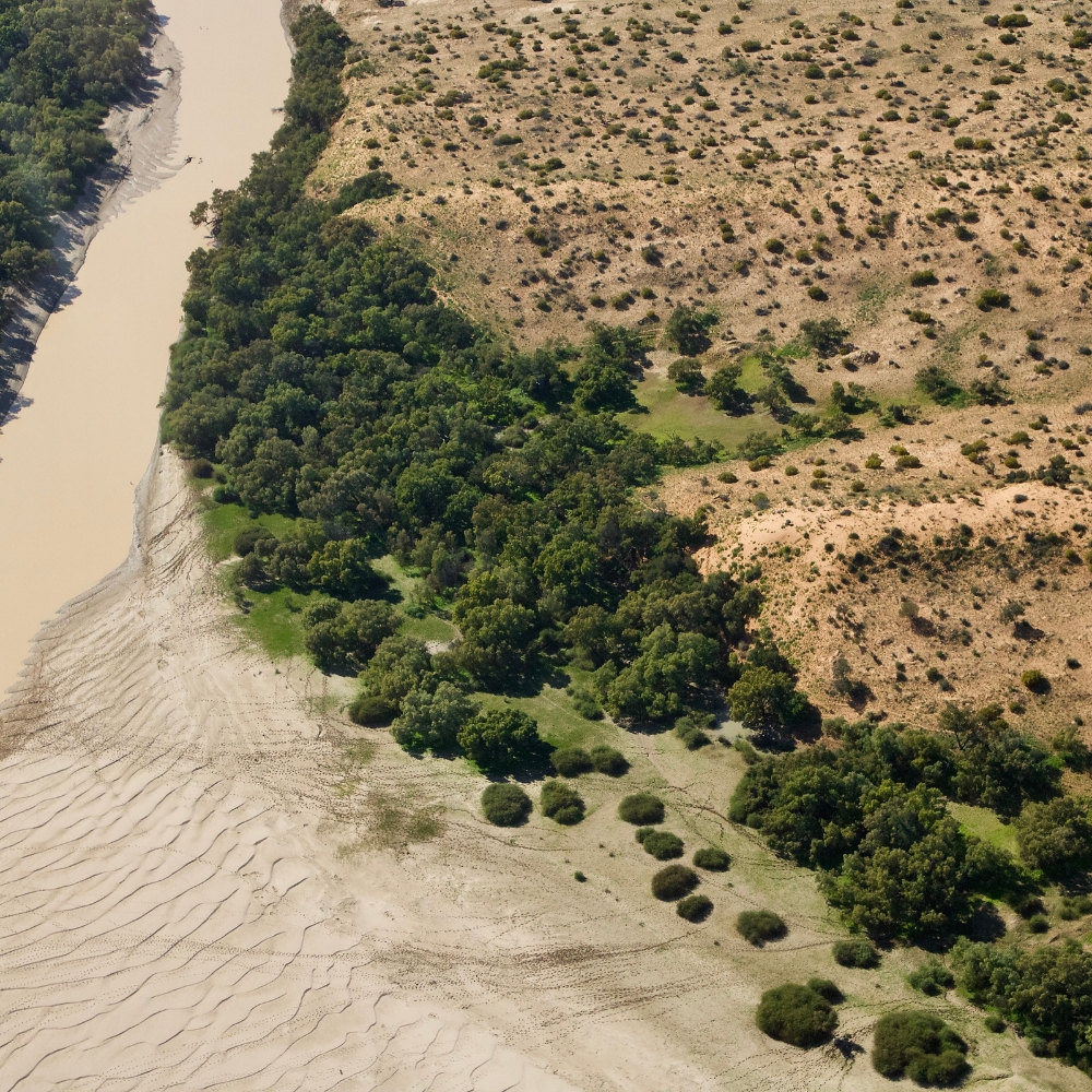 Aerial view of Kati Thanda–Lake Eyre in flood with shallow water across the salt pan